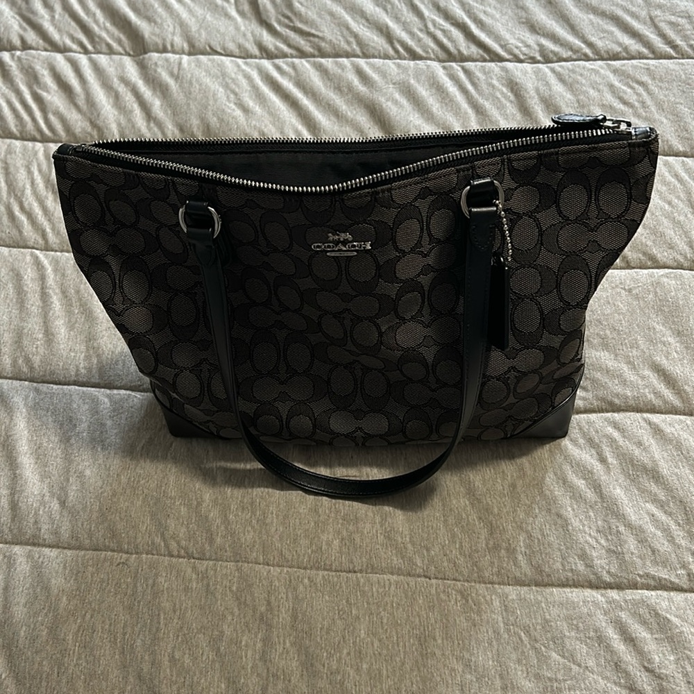 Black and gray coach purse